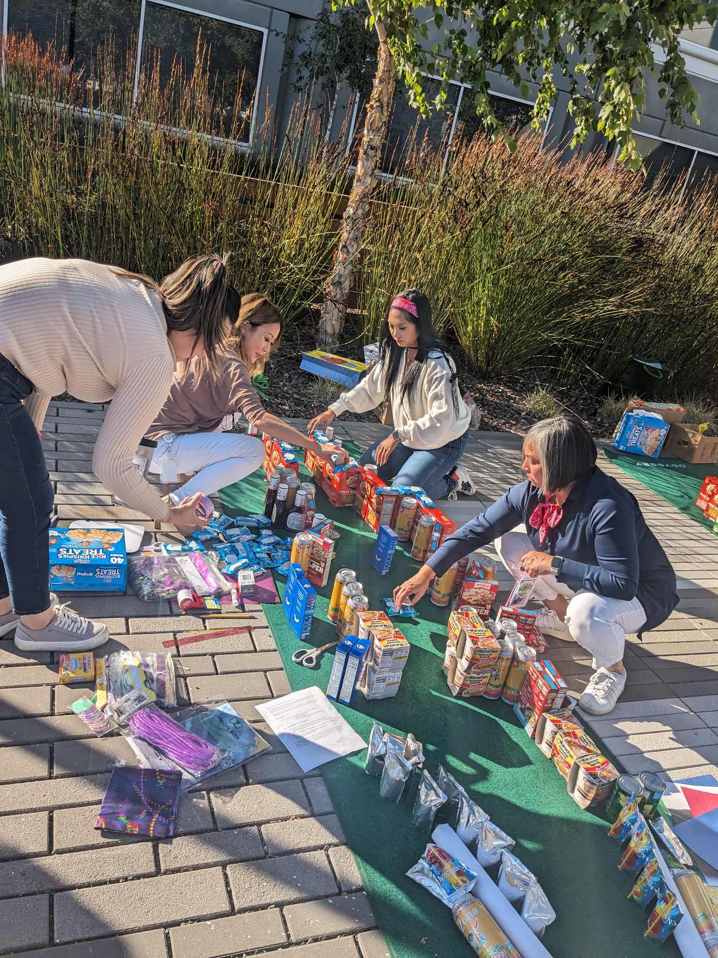 A team selects canned goods and materials for its golf hole