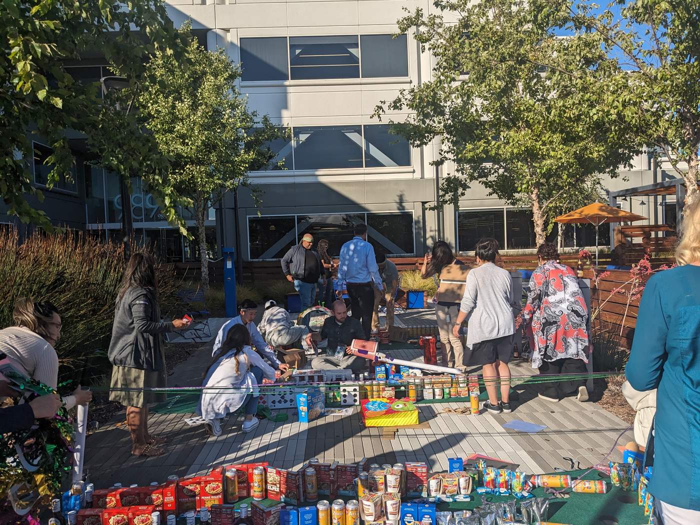 Teams prepare their colorful outdoor golf course
